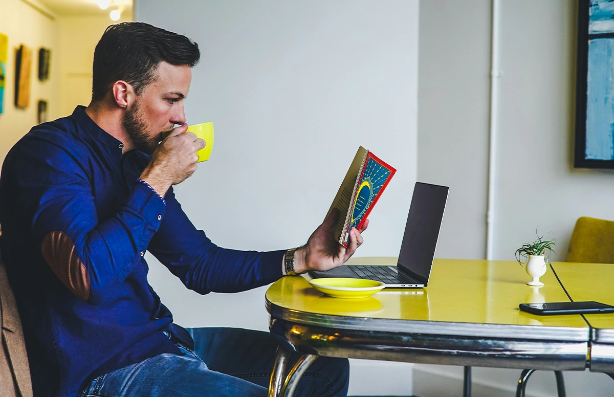 A man drinking coffee